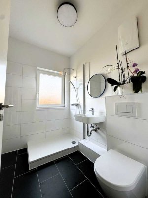 Sanierte Dachwohnung mit Balkon, in zentraler und ruhiger Wohnlage