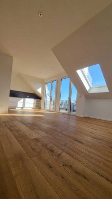 Exklusive Dachgeschosswohnung mit 2,5 Zimmern auf 119 m², zwei Balkone und stufenlosem Zugang
