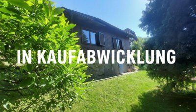 Ausbaufähiges Holzhaus mit großem Grundstück in Eichgraben