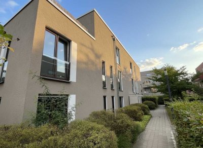 Hochwertige EG-Wohnung mit großzügigem Garten in bester Lage