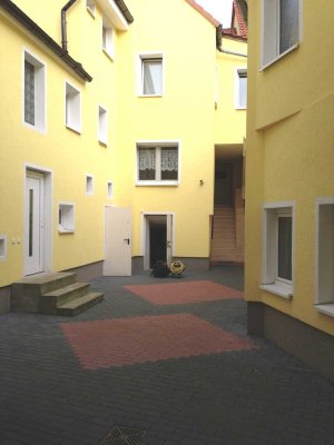 Mehrfamilienhaus mit 11 Wohneinheiten und ca. 82.000,- € Jahresnettomiete