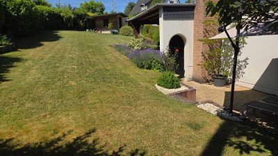 Großzügige 3-Zimmer-Wohnung in Zweifamilien-Haus mit Garten & zwei Terrassen in zentraler Lage
