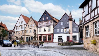 2 Zimmer mit sonniger Terrasse mit Blick über die Stadt im Zentrum