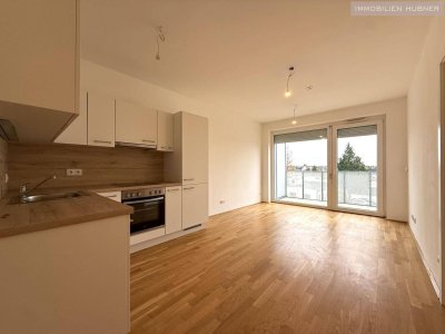 Günstige Neubauwohnung mit MEGA-SÜD-BALKON (11,64m²) nahe Akademiepark