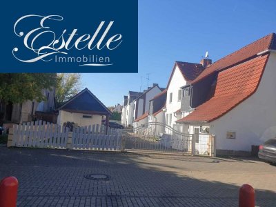 Ehem. 4 Reihenhäuser jetzt 4 WE - Garage - Carport - Pellets Heizung - großer gepflasterter Innenhof