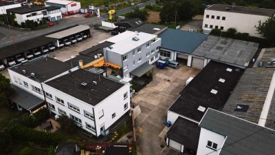 Vielseitiges Immobilienensemble in Koblenz-Metternich: Wohnen & Arbeiten auf ca. 1.997 m² Grundstück