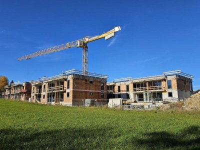 Paket - Angebot A05: Provisionsfreie 75m² Neubauwohnung im 1. OG mit 9m² Balkon und 2 TG-Plätze in Holzhäuseln!