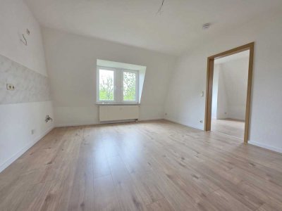 Moderne Wohnung mit offener Wohnküche und Tageslichtbad in zentraler Lage