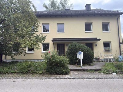 Mehrfamilienhaus (3 Wohnungen und eine Doppelhaushälfte)