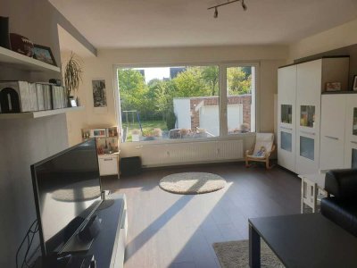 Schöne lichtdurchflutete EG Wohnung mit Garten