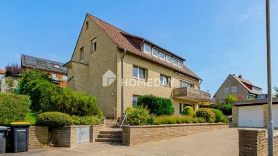 Mehrfamilienhaus mit drei Wohneinheiten und großzügiger Terrasse