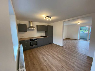 Gehobene 2,5-Zimmer-Wohnung mit Einbauküche, Balkon, Gartennutzung und direkter Waldrandlage