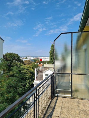 RUHIGE 2-ZIMMERWOHNUNG MIT TERRASSE UND GARTENBLICK