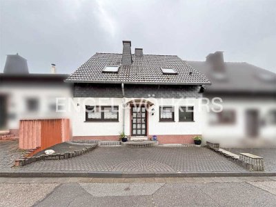 Solides Einfamilienhauses mit Einliegerbereich in Höhen- u. Blicklage