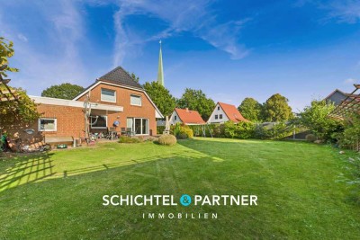 Surheide | Schickes Einfamilienhaus mit Terrasse, Garage und großem Garten
