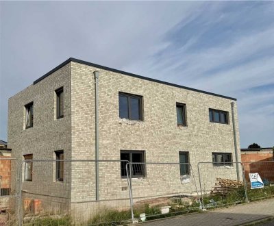 Moderne Neubauwohnung in Hü-City – Wohnen im exklusiven Zweifamilien-Niedrigenergiehaus