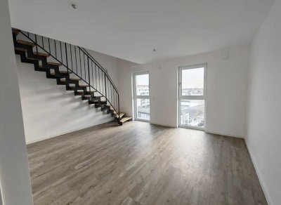 Neuwertige Maisonette-Wohnung mit vier Zimmern sowie Balkon und Einbauküche in Fürth