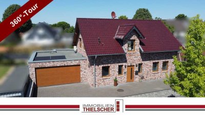 Exklusives Einfamilienhaus mit großer Doppelgarage, schönem Gartenbereich und Smart-Home-Komfort