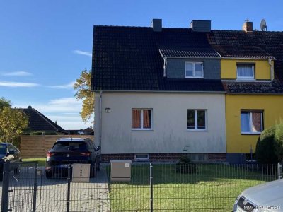 Vermietete Doppelhaushälfte auf eigener Scholle – Kapitalanlage in Brandenburg