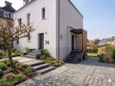 Großzügige EG-/Souterrain-Wohnung im Zweifamilienhaus mit Garten - ruhig & exponiert