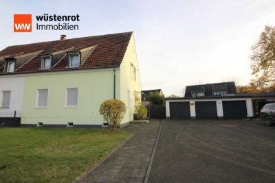 Zweifamilien-Doppelhaushälfte mit drei Garagen – auch als Einfamilienhaus perfekt!