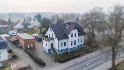 Attraktives und individuelles Mehrfamilienhaus mit 4 Wohneinheiten in zentraler Lage
