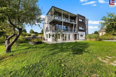 Moderne Dachgeschosswohnung am Aichwaldsee mit privatem Seezugang!