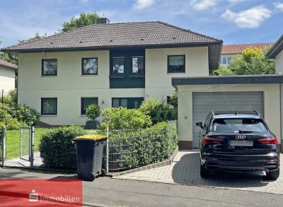 Großzügiges Einfamilienhaus in Hanglage mit Terrasse, herrlichem Garten und viel Raum zur Entfaltung