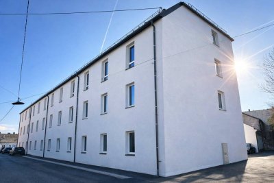 Neubau: Helle Wohnung mit E-Ladestation, Balkon und moderner Küche