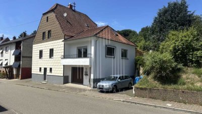 Viel Raum zum Leben – 9-Zimmer-Haus mit Garage, Garten & Grünfläche