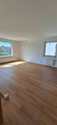 Kernsanierte 3,5-Zimmer-Wohnung mit Balkon, Garage und Gemeinschaftsgarten in ruhiger Lage