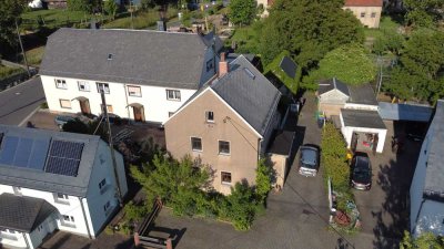 Idyllisches Einfamilienhaus mit Garten und Pacht-Obstwiese