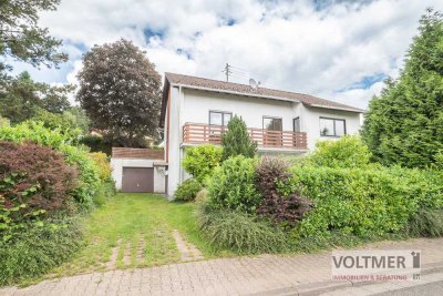 FLUIDUM - gepflegtes Einfamilienhaus mit möglicher Einliegerwohnung und zwei Garagen in Frankenholz!