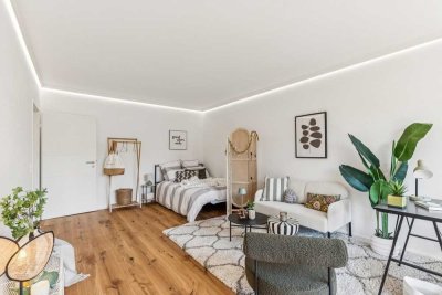 Balkon mit Grünblick: moderne 1-Zimmer-Wohnung mit Aufzug und Tiefgarage in Feudenheim