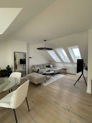 3-Zimmer-Dachgeschosswohnung mit modernem Charme und einem Ausblick über die Stadt