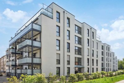 Etagenwohnung mit großer Dachterrasse, Kamin & Tiefgarage – Wohnen mit Komfort und Nachhaltigkeit