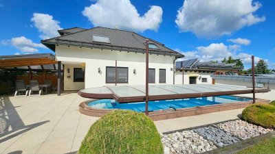 Luxuriöses Einfamilienhaus mit angrenzender Gewerbeeinheit!