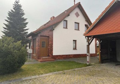 Charmante 2-Zimmer-Wohnung mit Terrasse, Gartenhaus & Stellplatz