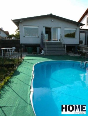 TOP Preis für Bungalow mit großem Wohnwintergarten, Pool und viel Platz für Ihren Fuhrpark