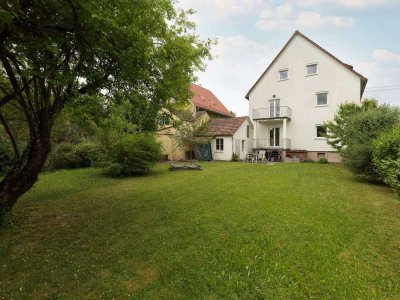Charmantes Mehrfamilienhaus mit Gartenidylle–ideal für Familien, Generationenwohnen oder Vermietung