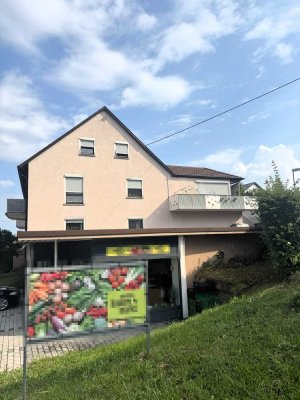 Solide Kapitalanlage: Doppelhaushälfte mit 3 Wohneinheiten und Ladeneinheit