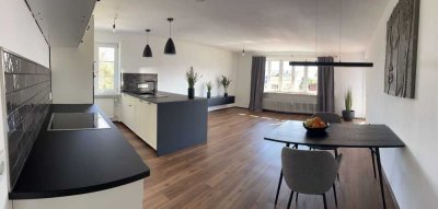 RESERVIERT - Moderne 3-Zimmer-Wohnung mit offenem Grundriss, Gartenanteil & Bergblick