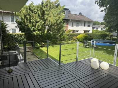 Erdgeschosswohnung mit Terrasse, Gartennutzung und Carport