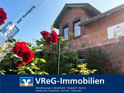 Absolut zentral und doch für sich! Einfamilienhaus mit angebautem Gewerbeteil in Itzehoe