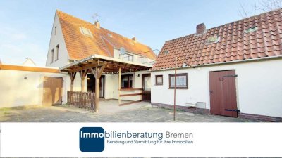 Doppelhaushälfte mit Garage und Garten  in Delmenhorst