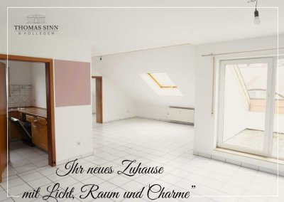 Helle 2,5- bis 3-Zimmer-DG-Wohnung mit Außenstellplatz in ruhiger Wohngegend