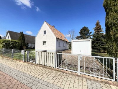 Freistehendes Siedlungshaus mit Garten und Garage in Maxdorf