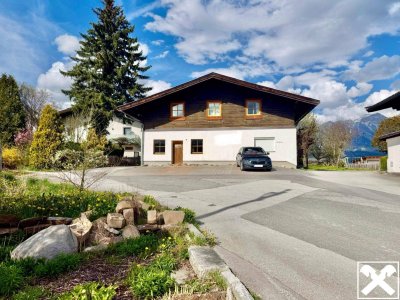 Ein Haus voller Möglichkeiten: Wohnen und Büro mit Sanierungsbedarf