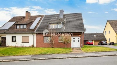 Charmante DHH in traumhafter Lage für Gartenliebhaber – mit Garage, Pool & Ausbaureserve