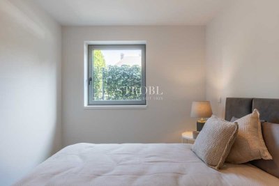 SEMI - FURNISHED - Teilmöblierte 2-Zimmer-Terrassenwohnung am Isarhochufer